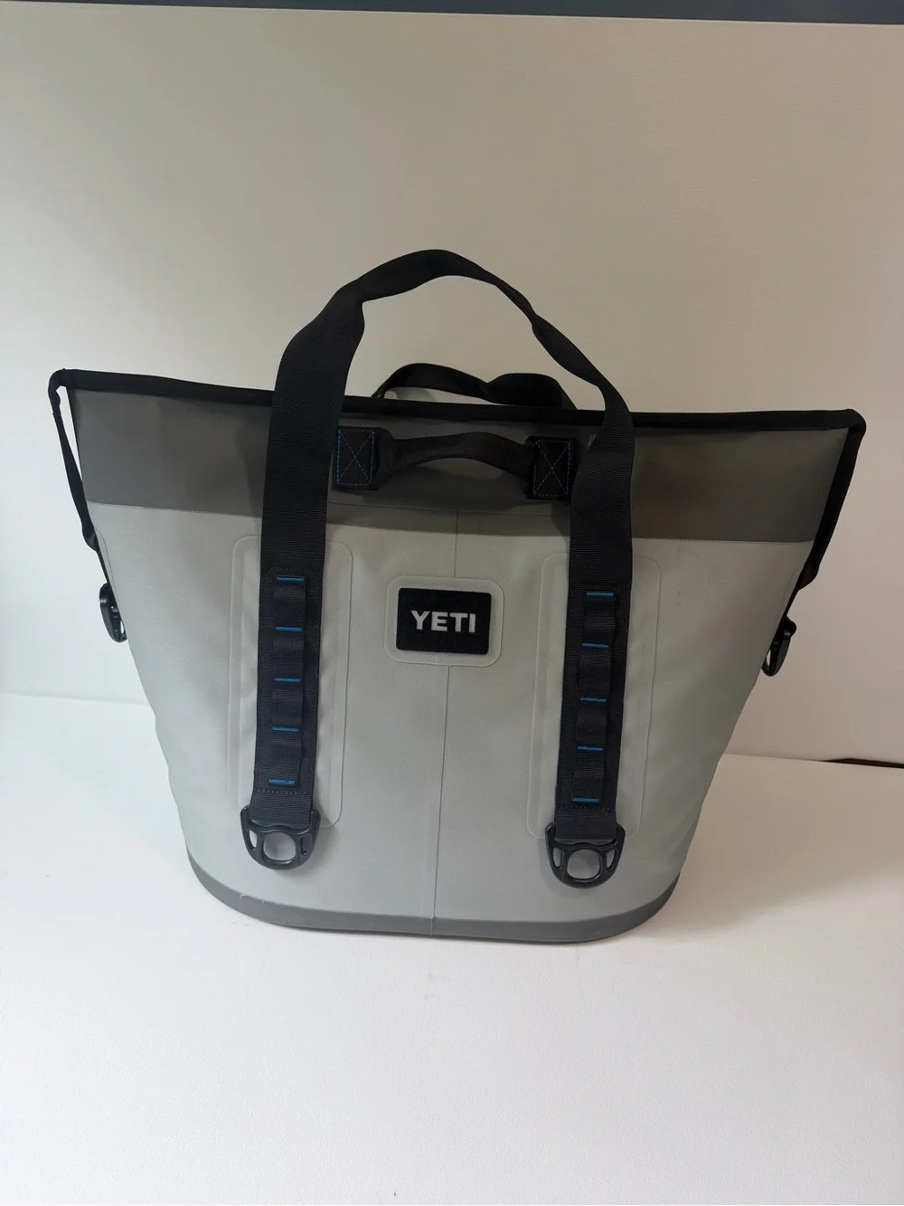 Yeti Hopper Two 30 Tote in Gray with Black Handles and Blue Zipper MSRP: $350